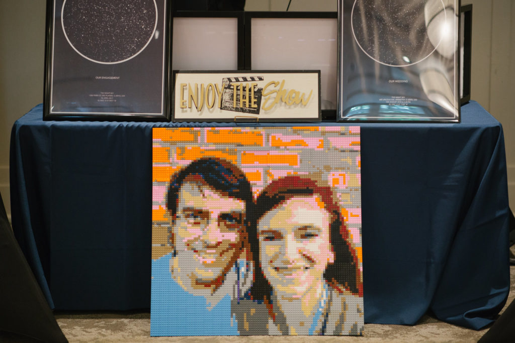 A large picture of two people made entirely out of Legos.